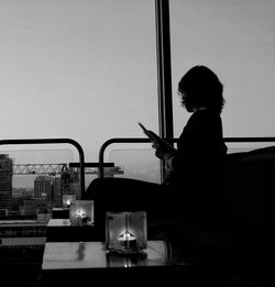 Woman sitting on bench