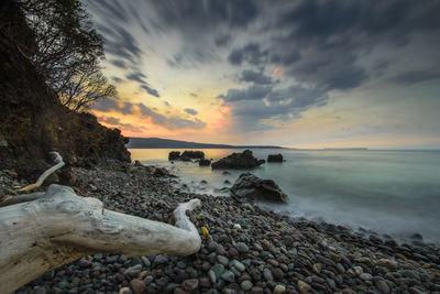 Scenic view of sea against sky during sunset