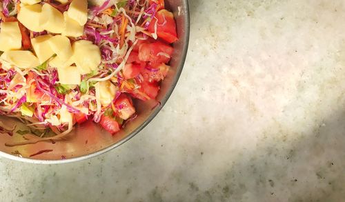 Close-up high angle view of salad in bowl on table