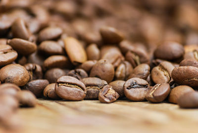 Close-up of coffee beans on table