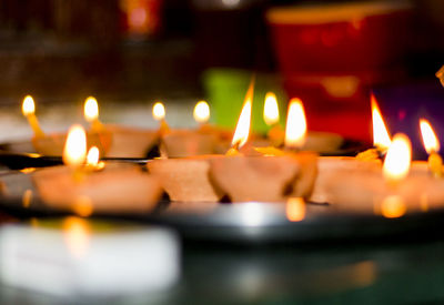 Close-up of burning candles