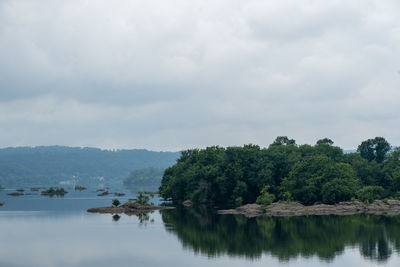 The bliue toned landscape of the susquehanna river on a rainy day.