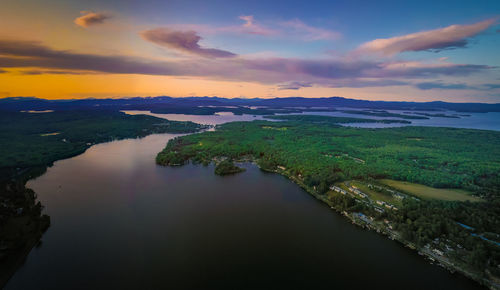 Scenic view of lake against sky during sunset