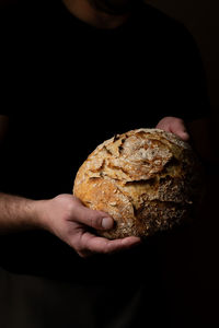 Midsection of woman holding food