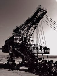 Low angle view of ferris wheel against sky