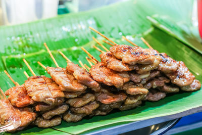 Close-up of meat on barbecue grill