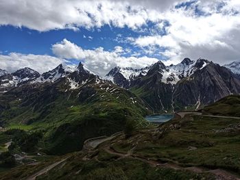 Scenic view of snowcapped mountains against sky