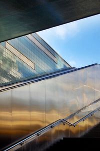 Low angle view of bridge against sky in city