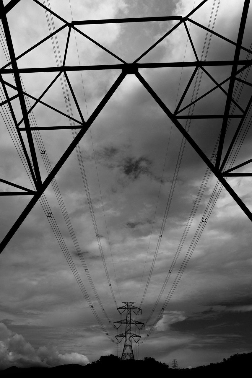 LOW ANGLE VIEW OF ELECTRICITY PYLON AGAINST CLOUDY SKY