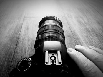 Close-up of hand holding camera