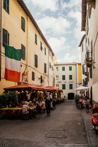 People walking on street in city