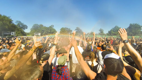 People at town square against sky