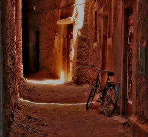 Bicycle parked at night