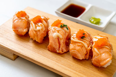 High angle view of sushi on cutting board