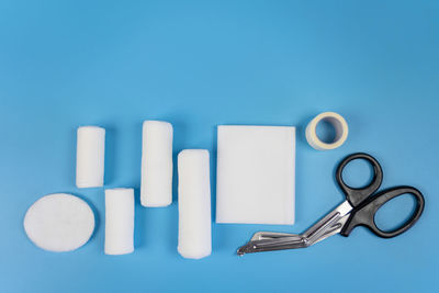 High angle view of dental equipment against blue background