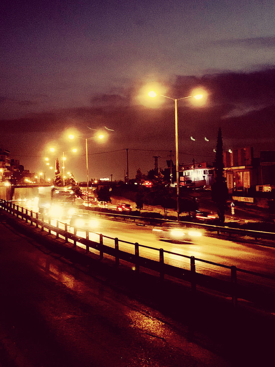 ILLUMINATED STREET LIGHT AT NIGHT