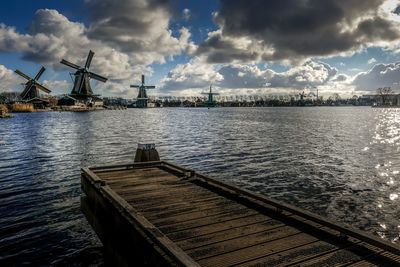 Pier over sea against sky