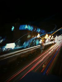 High angle view of light trails on road