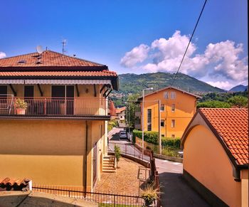 View of residential buildings against sky