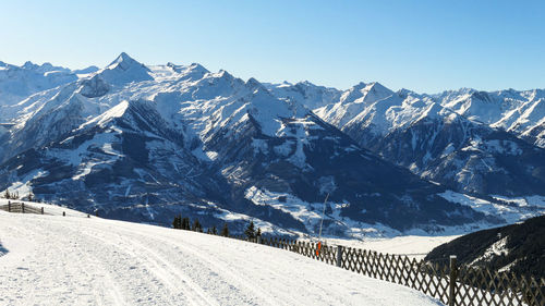 Skiing track in austria alps under blue sky