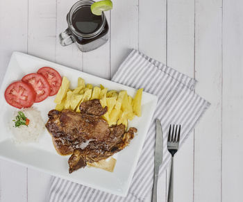 High angle view of breakfast served on table