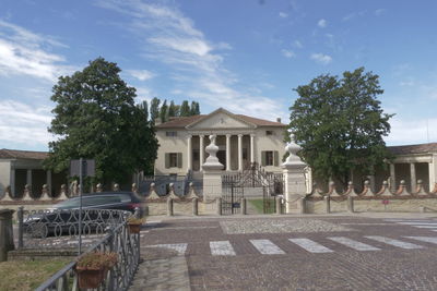 View of historic building against cloudy sky