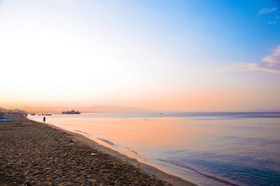 Scenic view of sea at sunset