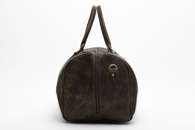 Close-up of telephone over white background