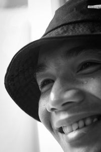 Close-up portrait of boy wearing hat
