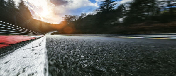 Surface level of road against sky during winter