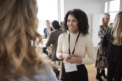 Smiling woman during coffee break