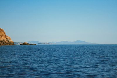 Scenic view of sea against clear sky