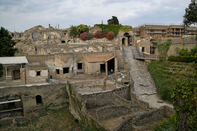 High angle view of old ruin city against sky