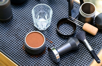 High angle view of equipment on table