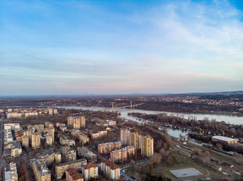 High angle view of city buildings against sky