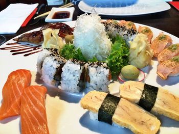 Close-up of sushi served on table