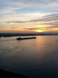 Scenic view of sea at sunset