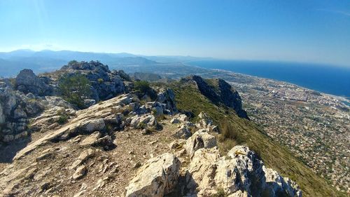 High angle view of mountain against blue sky