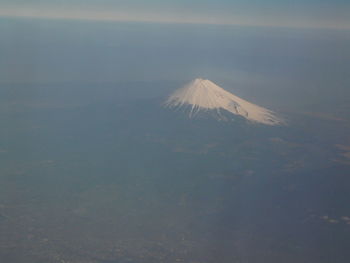 View of volcanic landscape against sky