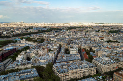 Aerial city landscape of paris, lots of roofs characteristic roofs and chimney