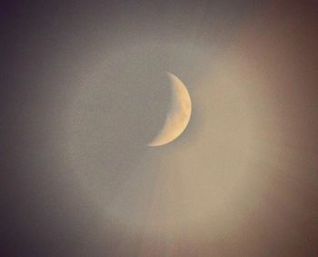 Low angle view of moon in sky