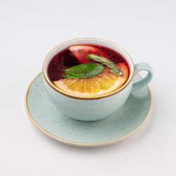 High angle view of tea served on white background