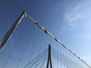 Low angle view of basketball hoop against sky