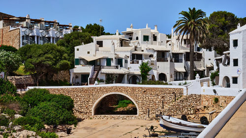 Binibeca vell white village architecture in menorca island, spain