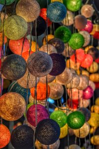 Close-up of multi colored decorations for sale in market