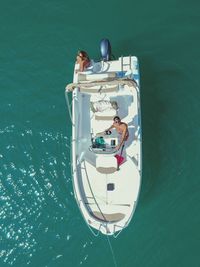 High angle view of man on boat in sea