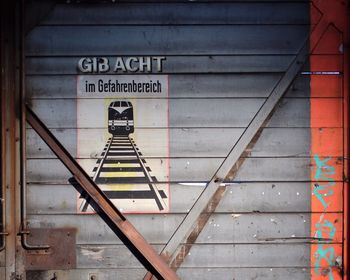 Information sign on brick wall