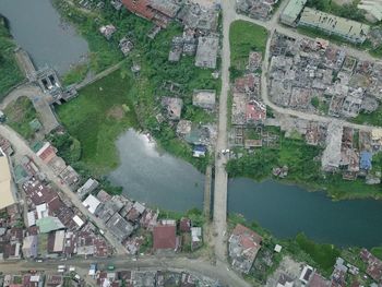 High angle view of river amidst buildings in town