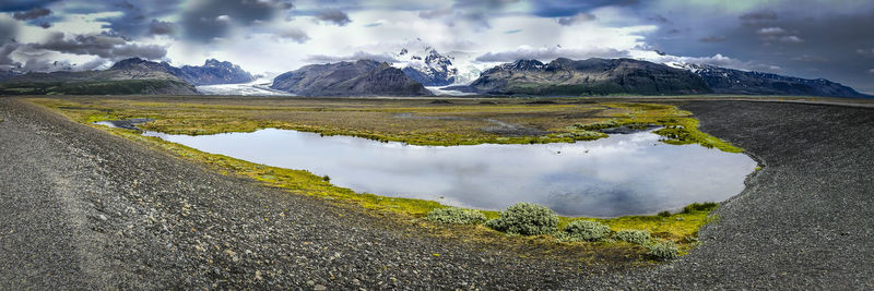 Panoramic view of lake against sky during winter