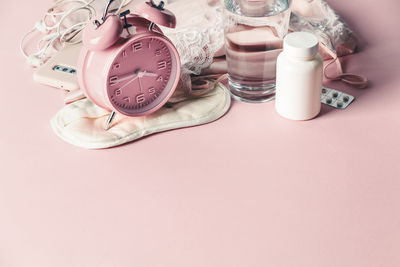 High angle view of clock on table